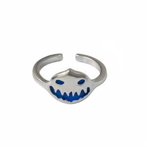 Adjustable silver monster face ring with blue enamel glow for Halloween styling