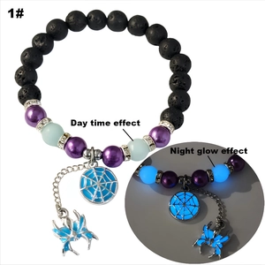 Spider and web glow bead bracelet with black volcanic stone and luminous detail