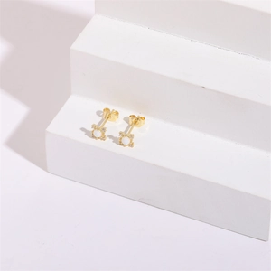Elegant geometric opal and zircon star stud earrings in gold plated finish