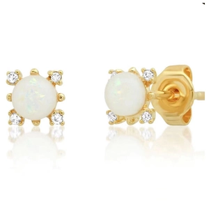 Detail view of round opal stud earrings with gold plating and cubic zirconia accents