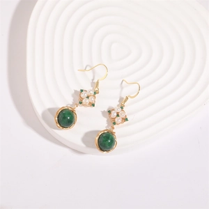 Elegant gold freshwater pearl drop earrings with green gemstone and zircon accents