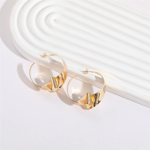 Exaggerated 14K gold plated knotted hoop earrings with irregular folded metal texture