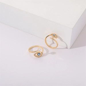 Gold Evil Eye open ring with blue enamel, white pearls and sparkling cubic zirconia