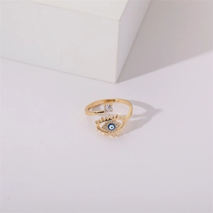 Detailed macro view of Evil Eye adjustable ring with pearl, zircon and blue enamel finish