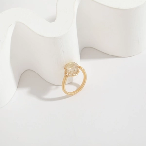 Handmade 14k gold-filled wire wrapped ring featuring a natural rutilated quartz stone