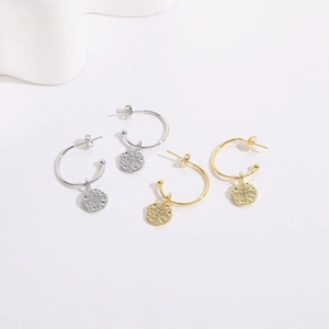 Star-patterned C-shaped hoop earrings with coin charms in 14K gold and silver plating