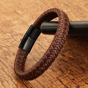 Men's woven dark brown leather bracelet with a polished black magnetic steel clasp
