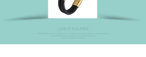 Detail of black woven leather bracelet showing the gold buckle and soft skin-friendly texture