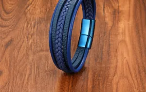 Detailed view of multi-layer blue braided leather bracelet with magnetic steel clasp