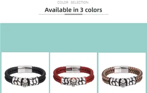 Close-up of braided leather bracelets with skull charms in black, red, and brown colors