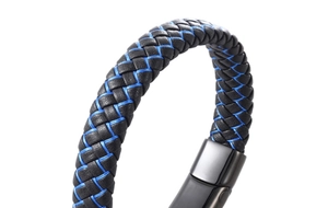 Close-up of black braided leather bracelet with blue contrast cord and metal clasp