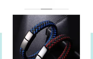 Macro detail of braided leather bracelets with red and blue accents and magnetic metal clasp