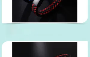 Macro detail of red and black braided leather bracelet with polished silver metal clasp