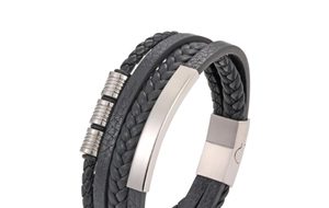 Detail of multi-layer black leather woven bracelet with stainless steel metal accents