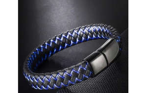 Detailed close-up of men's braided leather bracelet with black and blue fiber weave texture