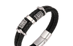 Close-up of double-strand leather men's bracelet with Viking runes and magnetic clasp