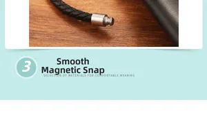 Detailed close-up of the smooth metal clasp and black woven leather bracelet cord
