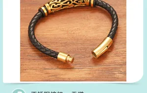 Dettaglio della chiusura magnetica in acciaio dorato su bracciale in pelle nera