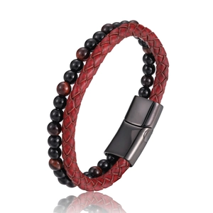 Detail of red leather cord and tiger eye bead bracelet with black magnetic steel clasp