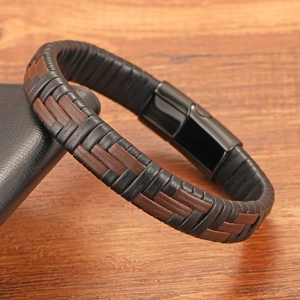 Detail of woven leather punk bracelet with high-quality black metal magnetic clasp