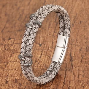 Retro woven leather bracelet with metal dragon claws and polished magnetic clasp