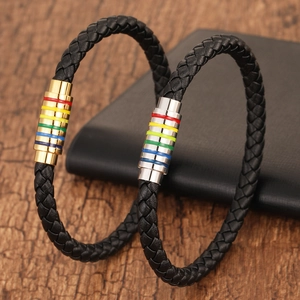 Detail of woven leather bracelets with rainbow magnetic clasps in gold and silver finish