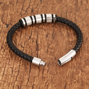 Braided black leather bracelet for men featuring textured stainless steel metal beads