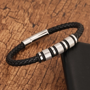 Braided black leather bracelet with stainless steel knurled beads and magnetic clasp