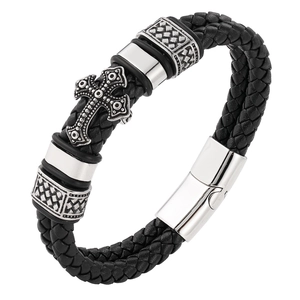 Detail of multi-layer black braided leather bracelet with stainless steel cross magnetic clasp