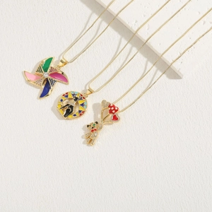 Colorful enamel windmill and black cat silhouette pendants on gold chain necklaces