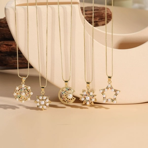 Detail of 18K gold-plated star and pearl necklaces with colorful zircon inlays