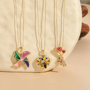 Detailed macro view of colorful windmill and bear pendants with zirconia inlay