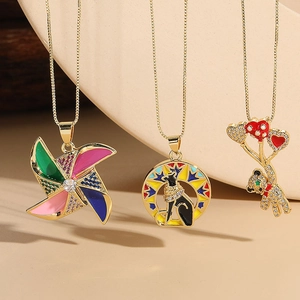 Golden necklaces with colorful windmill, Egyptian cat, and bear pendants with zircon stones