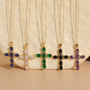 Collares de cruz con circonitas ovales en cinco colores y cadenas de oro de 14K