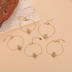 Bracelets ours luxueux plaqués or 14K avec des pierres de zircon colorées