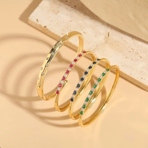 Elegant gold-plated bangle set with sparkling zircons and red, blue, and green gemstones