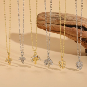 Leaf and Tree of Life zircon pendant necklace in 14K gold and silver plating