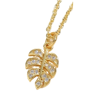 14K gold plated monstera leaf pendant necklace with zircon crystals on a fine chain