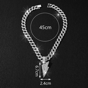 Silver cuban chain necklace with iced-out lightning bolt pendant measuring 6.7cm by 2.4cm