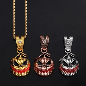 Halloween pompoen kettingen in goud en zilver met rode tanden en kristallen details