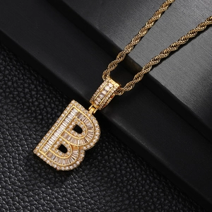 Iced out gold plated letter B pendant necklace with zircon crystals on rope chain