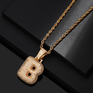 Golden iced-out letter B bubble pendant necklace with twisted rope chain for men and women