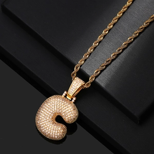 Gold letter C pendant necklace with cubic zirconia on a luxury rope chain