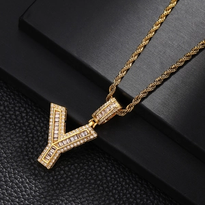 Detailed close-up of gold-plated letter Y pendant with inlaid cubic zirconia on rope chain