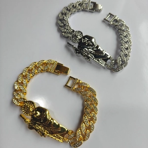 Iced out St. Jude Cuban link bracelet set with white crystals in gold and silver finish