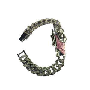 Hip hop St. Jude bracelet featuring iced out Cuban link chain and religious pendant