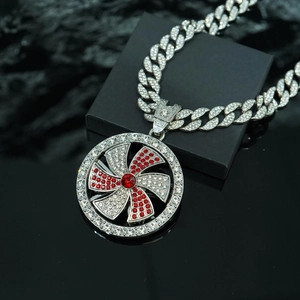 Colgante de molinillo giratorio con piedras rojas y blancas en cadena cubana