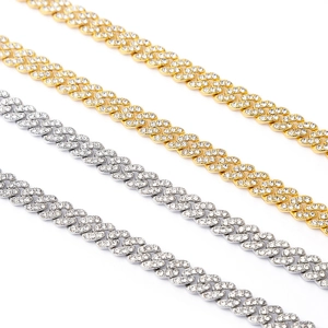 Detailed close-up of 9mm Cuban link chains in gold and silver with full diamond micro-pave