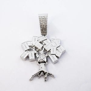 Detailed close-up of money tree hip-hop pendant with $100 bills and crystal bail