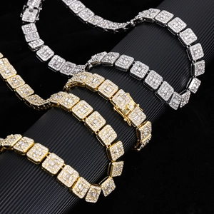 Detail of gold and silver cuban link bracelets with sparkling pave zircons